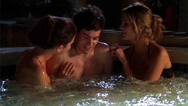 Seth in the hot tub with Summer and Marissa